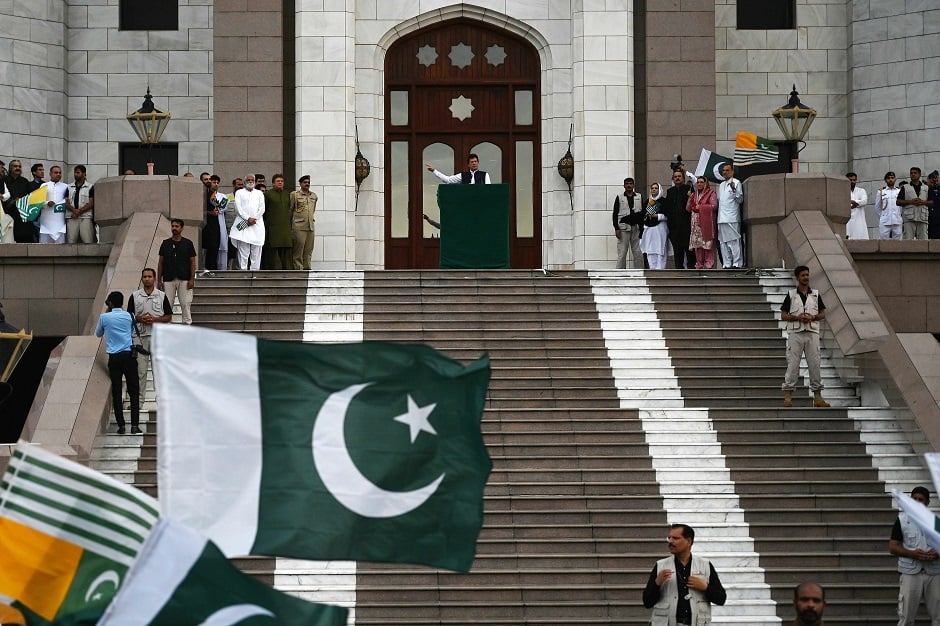 PM addresses the large group of people during Kashmir Hour. PHOTO: AFP