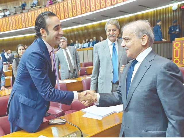 prime minister shehbaz sharif shakes hands with ppp chairperson bilawal bhutto zardari during the budget session photo ppi