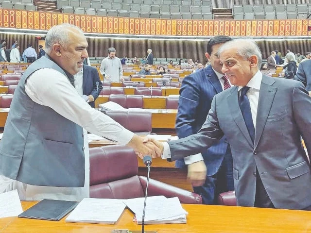 pm shehbaz sharif shakes hands with pti leader asad qaiser during the budget session photo ppi pm shehbaz sharif shakes hands with pti leader asad qaiser during the budget session photo ppi