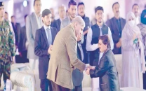 pm launches laptop scheme in k p pm launches laptop scheme in k p