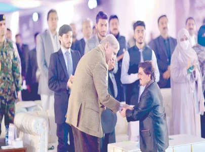 pm launches laptop scheme in k p pm launches laptop scheme in k p