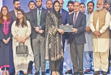 prime minister shehbaz sharif awards a laptop to a student in islamabad photo online