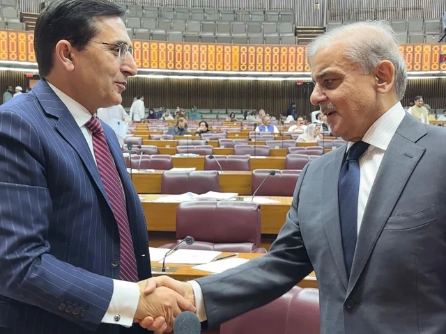 prime minister shehbaz sharif and pti chairman barrister gohar ali khan shake hands during a national assembly session on thursday june 26 2025 photo x government of pakistan prime minister shehbaz sharif and pti chairman barrister gohar ali khan shake hands during a national assembly session on thursday june 26 2025 photo x government of pakistan