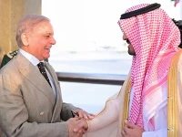 deputy governor of makkah prince saud bin mishal bin abdulaziz receives prime minister shehbaz sharif upon his arrival in jeddah on thursday for a three day official visit to saudi arabia photo pmo