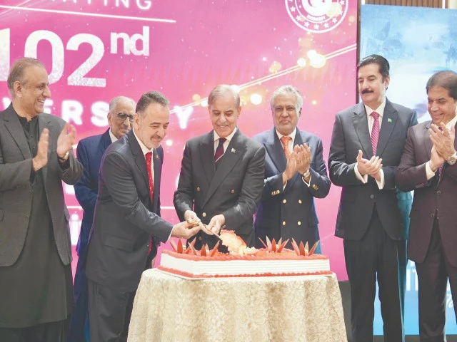 prime minister shehbaz sharif cuts a cake during a ceremony in islamabad marking the 102nd anniversary of turkiye s republic day photo sabah