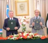 prime minister muhammad shehbaz sharif and the uzbek president pose after signing a protocol to boost bilateral trade between pakistan and uzbekistan to 2bn annually on thursday photo x