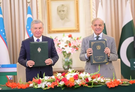prime minister muhammad shehbaz sharif and the uzbek president pose after signing a protocol to boost bilateral trade between pakistan and uzbekistan to 2bn annually on thursday photo x