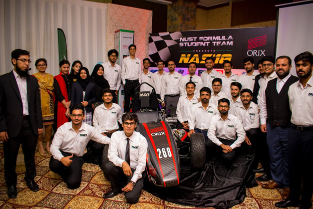 The PNEC students team posing with their car. PHOTO: COURTESY RIJA ZAFAR