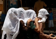 men ride on a motorbike as they cover their heads with a wet cloth to cool off and to avoid sunlight during a hot summer day as the heatwave continues in jacobabad pakistan may 26 photo reuters men ride on a motorbike as they cover their heads with a wet cloth to cool off and to avoid sunlight during a hot summer day as the heatwave continues in jacobabad pakistan may 26 photo reuters