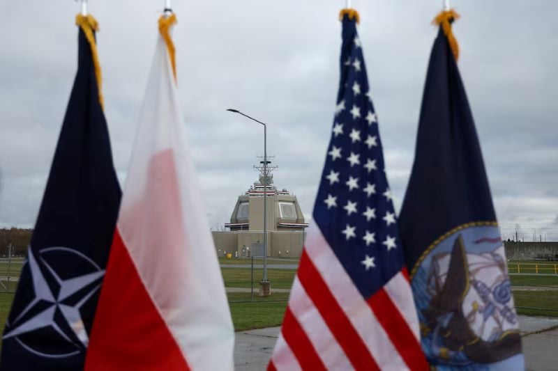 flags of nato poland us and us navy hang near the deck house of the american ballistic missile defence base to be integrated into the aegis ashore missile defense system on the day of its inauguration in redzikowo poland november 13 2024 photo reuters