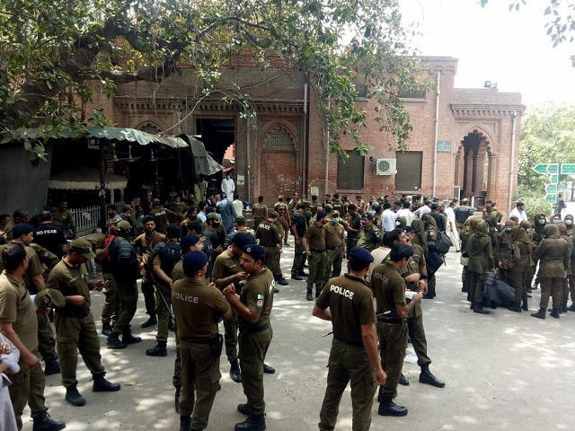 a file photo of police officials being deployed at the lahore high court photo express