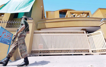 hostel shooting suspected murderer still at large