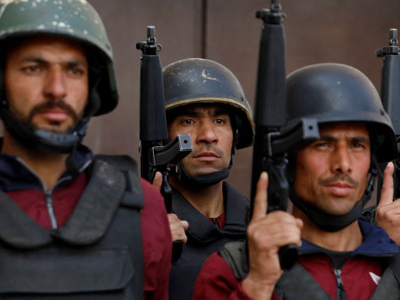 police officers hold their weapons during a training session at the elite police training centre in nowshera pakistan february 10 2023 newly graduated police officers are trained at the vast elite police training center for six months where they are taught how to conduct raids to rappel from buildings with a rope and use rocket propelled grenades and anti aircraft guns which they practice on a simulated militant training camp photo reuters