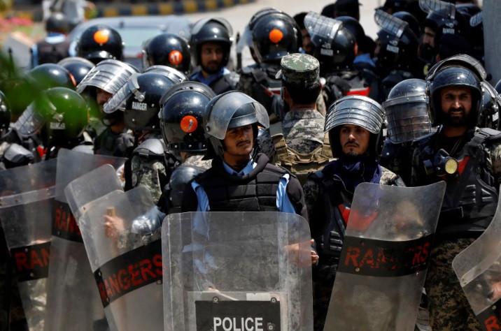 security officers in riot gear stand guard inside the high court premises after pakistan s former prime minister imran khan arrived to appear before the court in islamabad pakistan may 12 2023 reuters akhtar soomro