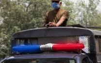 armed group storms house