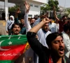 supporters of the pakistan tehreek e insaf pti political party chant slogans in support of imran khan outside parliament building islamabad pakistan april 3 2022 photo reuters file