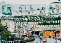 poll frenzy election banners line a road in muzaffarabad ahead of voting photo express poll frenzy election banners line a road in muzaffarabad ahead of voting photo express