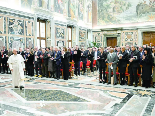 pope leo xiv walks on the day of an audience with international filmmakers and actors in the sala clementina at the vatican photo reuters pope leo xiv walks on the day of an audience with international filmmakers and actors in the sala clementina at the vatican photo reuters