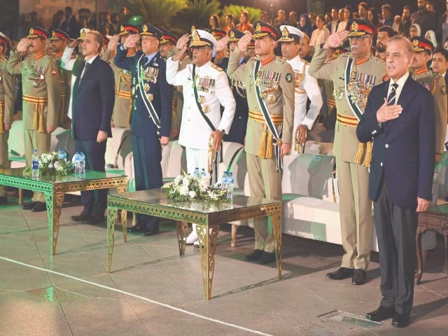 prime minster shehbaz sharif three services chiefs and other senior officials listen to the national anthem at a youm e tashakkur ceremony in islamabad photo express prime minster shehbaz sharif three services chiefs and other senior officials listen to the national anthem at a youm e tashakkur ceremony in islamabad photo express