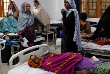 a pregnant woman lies on a hospital bed source reuters
