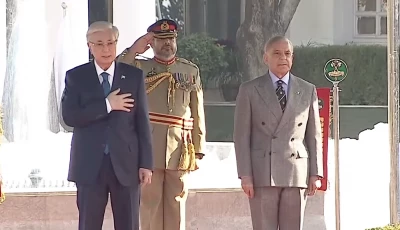 president of kazakhstan kassym jomart tokayev standing next to prime minister shehbaz sharif at the prime minister house screengrab