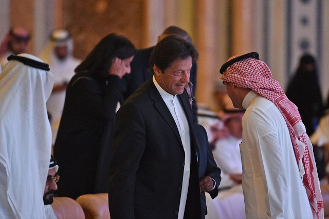 Prime Minister Imran Khan in a discussion with a presenter during the opening ceremony of the Future Investment Initiative FII conference on October 23, 2018 . PHOTO:AFP