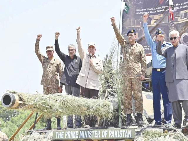 prime minister shehbaz sharif stands on a tank along with army chief general syed asim munir air chief marshal zaheer ahmed babar sidhu and his cabinet ministers during their visit at pasrur cantonment in sialkot photo ppi prime minister shehbaz sharif stands on a tank along with army chief general syed asim munir air chief marshal zaheer ahmed babar sidhu and his cabinet ministers during their visit at pasrur cantonment in sialkot photo ppi