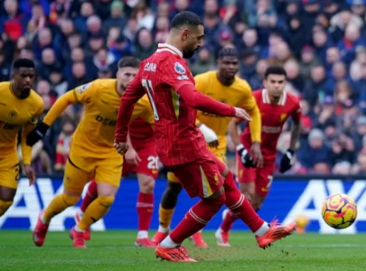 liverpool vs wolves 2 1 salah scores again in tense title scare liverpool vs wolves 2 1 salah scores again in tense title scare