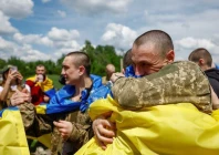 ukrainian prisoners of war pows react after a swap amid russia s attack on ukraine at an unknown location in ukraine may 31 2024 photo reuters