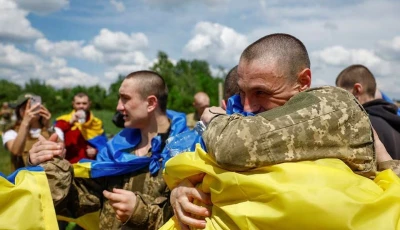 ukrainian prisoners of war pows react after a swap amid russia s attack on ukraine at an unknown location in ukraine may 31 2024 photo reuters