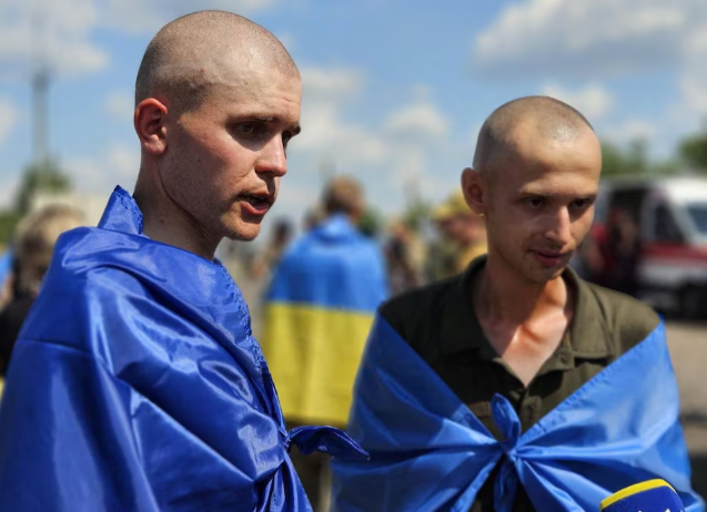 ukrainian prisoners of war pows are seen after a swap amid russia s attack on ukraine at an unknown location in ukraine in this handout picture released july 17 2024 photo reuters