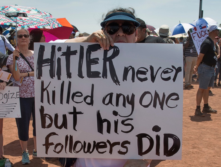 Demonstrators protest during the visit of US President Donald Trump to the site of the mass shooting in Dayton, Ohio. PHOTO: AFP