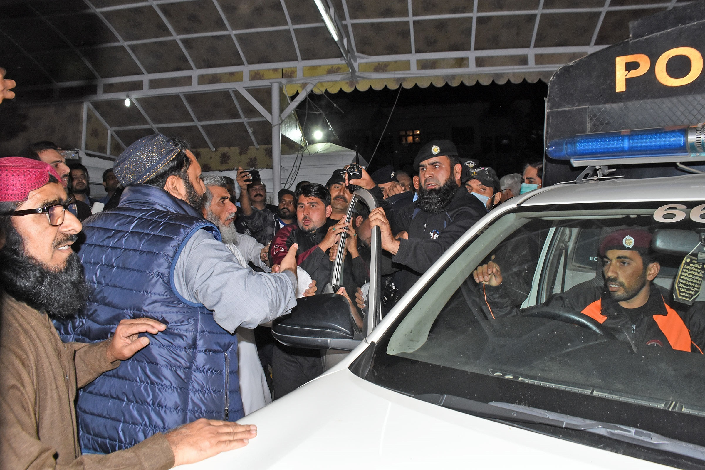 police storm parliament lodges scuffle with jui f volunteers