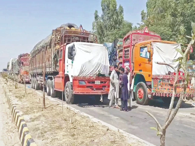 a large number of vehicles are stranded on larkana sukkur road in naudero due to a protest demonstration organised by civil society against the construction of new canals to divert additional water from the indus river photo ppi a large number of vehicles are stranded on larkana sukkur road in naudero due to a protest demonstration organised by civil society against the construction of new canals to divert additional water from the indus river photo ppi