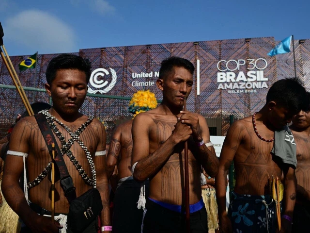 members of the indigenous movement munduruku ipereg ayu hold a protest outside the united nations climate summit venue in belem brazil photo afp members of the indigenous movement munduruku ipereg ayu hold a protest outside the united nations climate summit venue in belem brazil photo afp