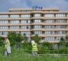 people work near the pakistan telecommunication authority pta headquarters building in islamabad on august 16 2024 photo afp people work near the pakistan telecommunication authority pta headquarters building in islamabad on august 16 2024 photo afp