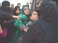 police officers detain pti supporters during a protest in karachi photo jalal qureshi express