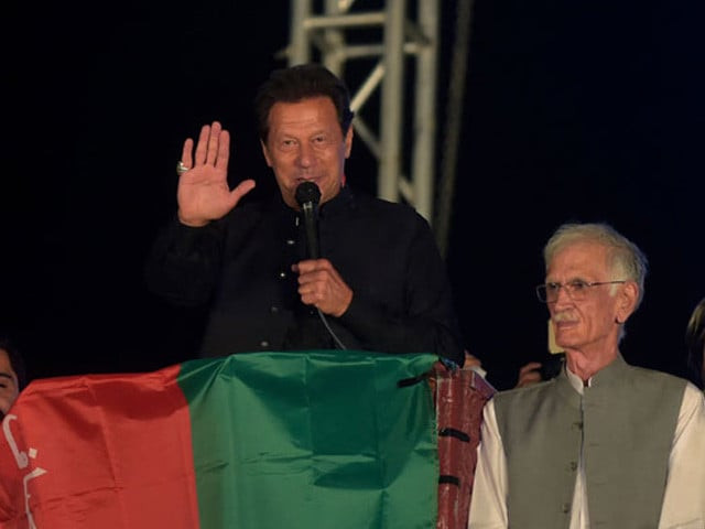 pakistan s ousted prime minister imran khan delivers a speech to pakistan tehreek e insaf pti party s supporters during a public rally in peshawar on april 13 2022 photo afp