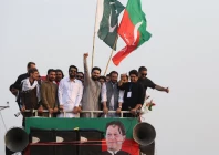 cm afridi raises his fist to supporters during a protest march by pti in bara on the outskirts of peshawar khyber pakhtunkhwa on october 7 2026 photo reuters
