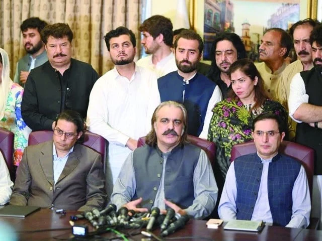k p chief minister ali amin gandapur speaks at a press conference flanked by pti chairman barrister gohar and senior party leaders photo screengrab