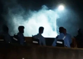 clashes erupt between pti protesters police at d chowk as heavy rain lashes islamabad