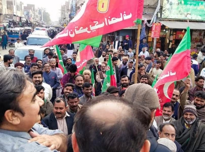 pti hits streets on eve of pm election