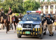 punjab police officials waiting alongside readied vehicles and on horseback photo express file