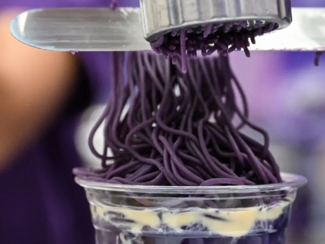 Ube halaya topping over sweet ube rice porridge (champorado) is a popular treat in the Philippines. PHOTO: AFP