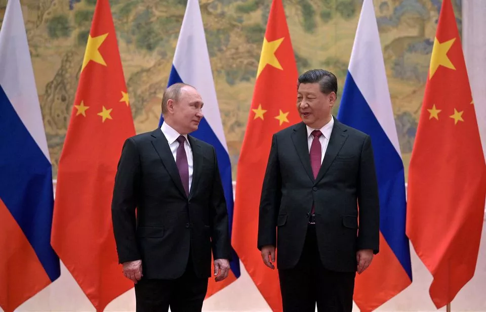 russian president vladimir putin attends a meeting with chinese president xi jinping in beijing china february 4 2022 photo reuters russian president vladimir putin attends a meeting with chinese president xi jinping in beijing china february 4 2022 photo reuters