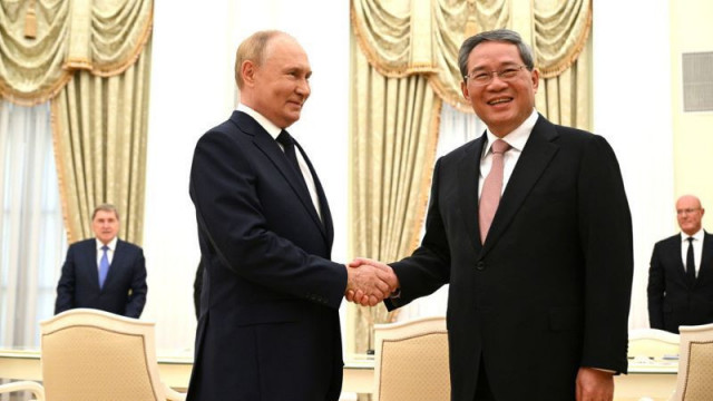 vladimir putin with chinese premier photo afp vladimir putin with chinese premier photo afp
