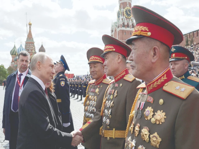 president vladimir putin meets with north korean servicemen on red square in moscow photo afp president vladimir putin meets with north korean servicemen on red square in moscow photo afp