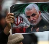 an iranian holds a picture of late general qassem soleimani as people gather to mourn him in tehran january 4 photo reuters