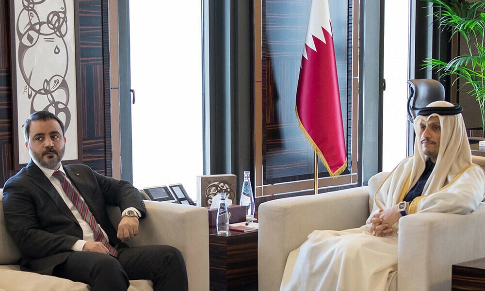 this handout image provided by the qatari ministry of foreign affairs mofa shows qatar s prime minister and minister of foreign affairs mohammed bin abdulrahman bin jassim al thani r receiving the foreign minister for the interim syrian government asaad al shaibani in doha on january 5 2025 photo afp