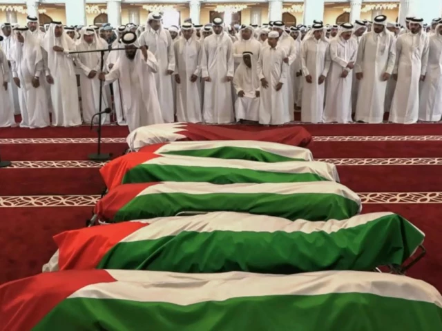 this grab from footage released by qatar tv shows qatar s emir sheikh tamim bin hamad al thani attends the funeral of people killed in an israeli strike on figures of the palestinain hamas movement two days earlier at sheikh mohammed bin abdul wahhab mosque in doha on september 11 2025 photo afp this grab from footage released by qatar tv shows qatar s emir sheikh tamim bin hamad al thani attends the funeral of people killed in an israeli strike on figures of the palestinain hamas movement two days earlier at sheikh mohammed bin abdul wahhab mosque in doha on september 11 2025 photo afp